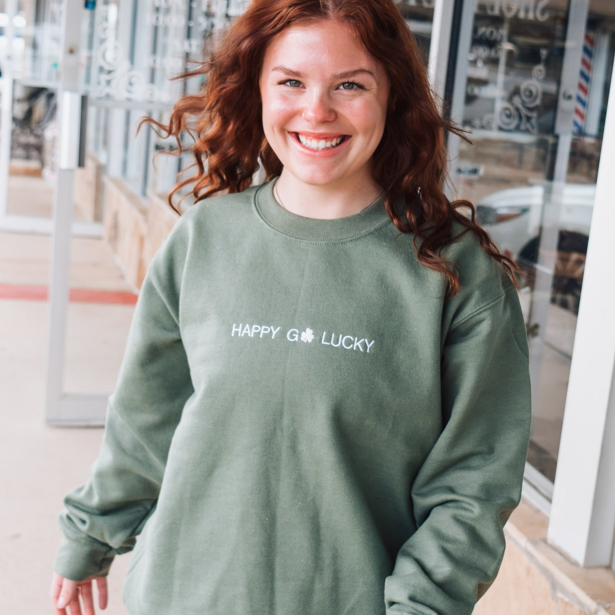 Happy Go Lucky Embroidered Sweatshirt