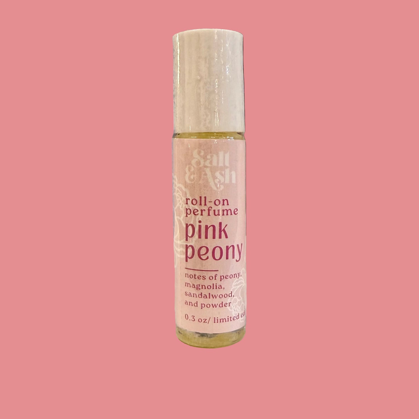 Roll-on perfume bottle labeled 'Pink Peony' by Salt & Ash