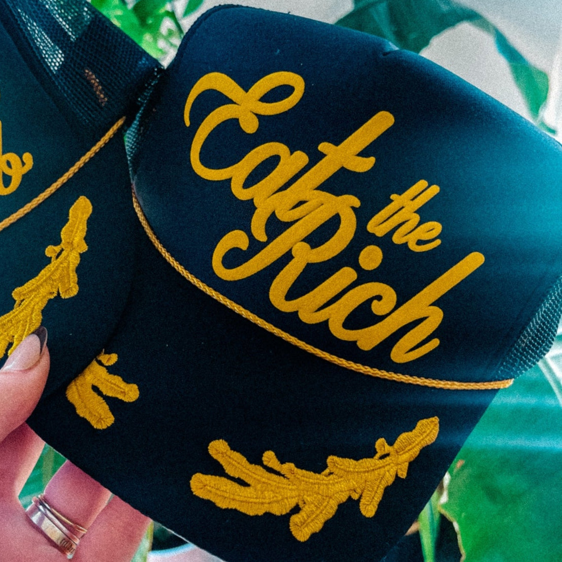 Eat The Rich Trucker Hat