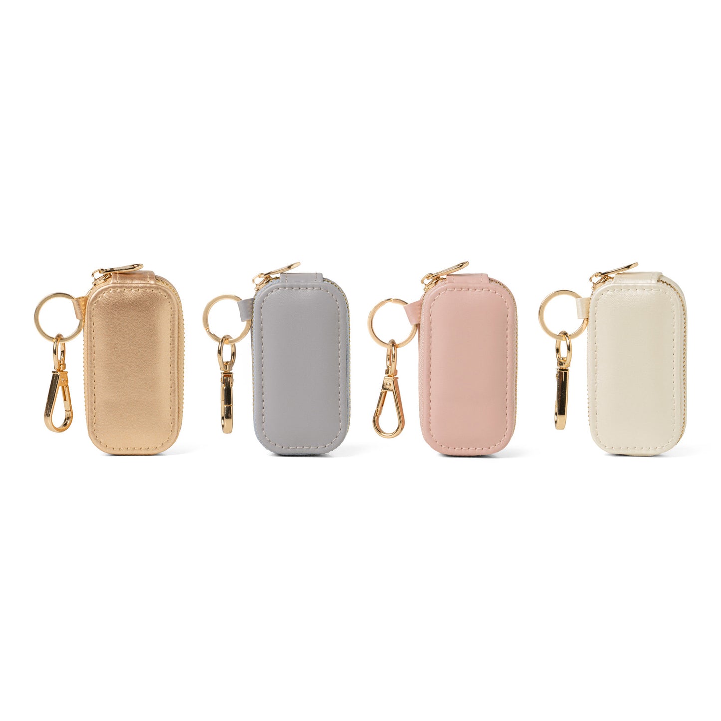 Four keychain pouches in beige, gray, pink, and cream on a white background