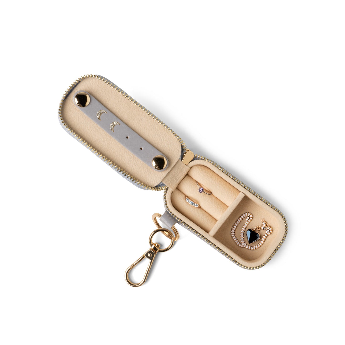 Beige jewelry case with keychain on a white background