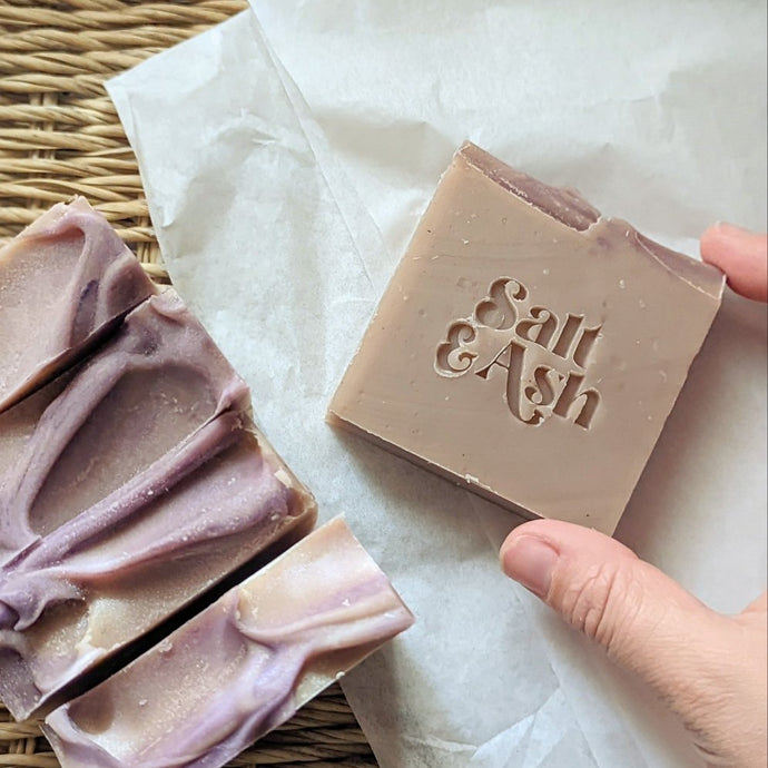 Lavender bar soap witj stamped Salt and Ash logo on wicker basket